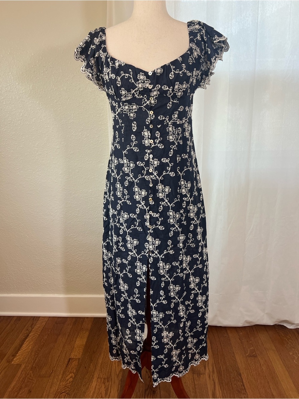 Zara navy embroidered eyelet midi dress with white floral embroidery. NWOT